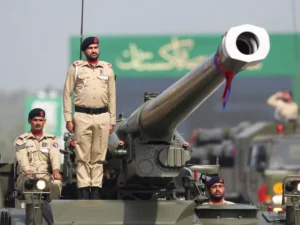 Soldier standing atop of the artillery vehicle on 23rd March parade day.