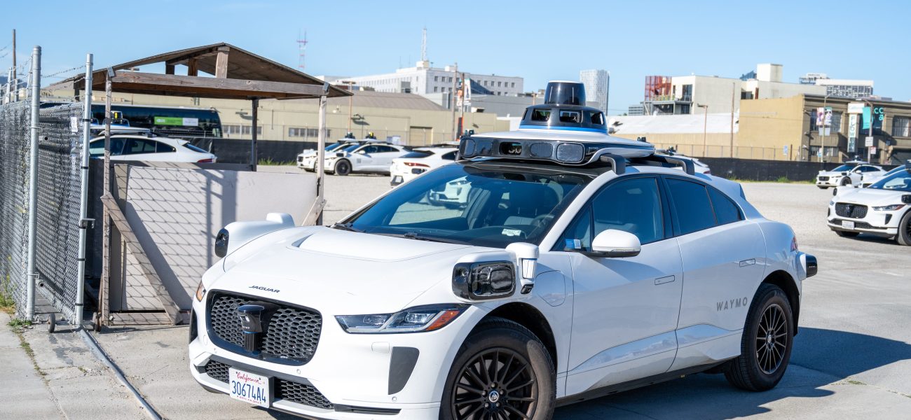 Silicon Valley’s Driverless Dream Hits a Human Snag, Offers a Taxi Instead
