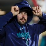 The Detached Observer: Star Catcher’s Injury Offers Unsettling Perspective on the Game