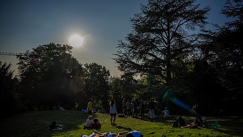 City Under Siege: Paris Parks Become Open-Air Dorms as Heat Scorches Europe