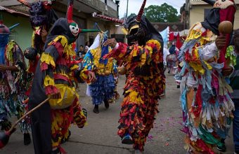 Infernal Rhythms: Venezuela’s Dancing Devils Persist Amidst Lingering Despair