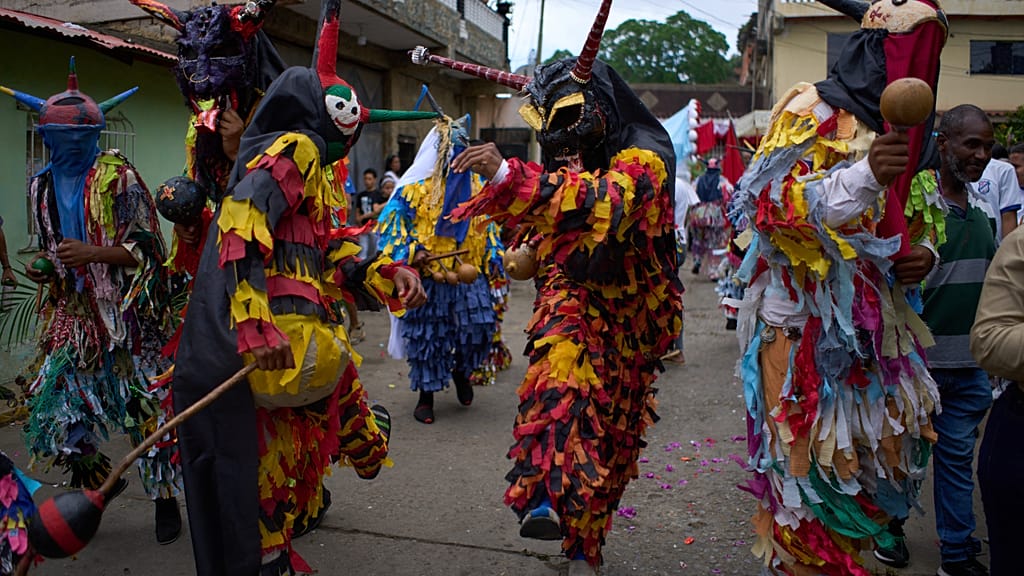 Infernal Rhythms: Venezuela’s Dancing Devils Persist Amidst Lingering Despair