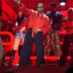 Usher Ends Awkward Onstage Interaction with Fan at Concert