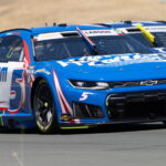 Ghosts and Greed: Larson’s Chicagoland Comeback Hints at Deeper Stakes Ghosts and Greed: Larson’s Chicagoland Comeback Hints at Deeper Stakes