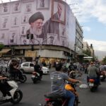 Iran’s Irony: Survivors Attend Funeral for Architect of Their Ordeals