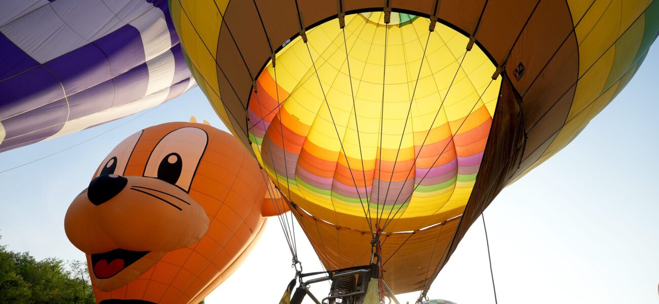 Canton’s Curious Carnival: Where Hot Air Balloons Meet Gridiron Gods, and Money Talks Loudest