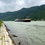 Rhine’s Fleeting Reprieve: Rain Offers Breath, But Economic Currents Still Turbulent