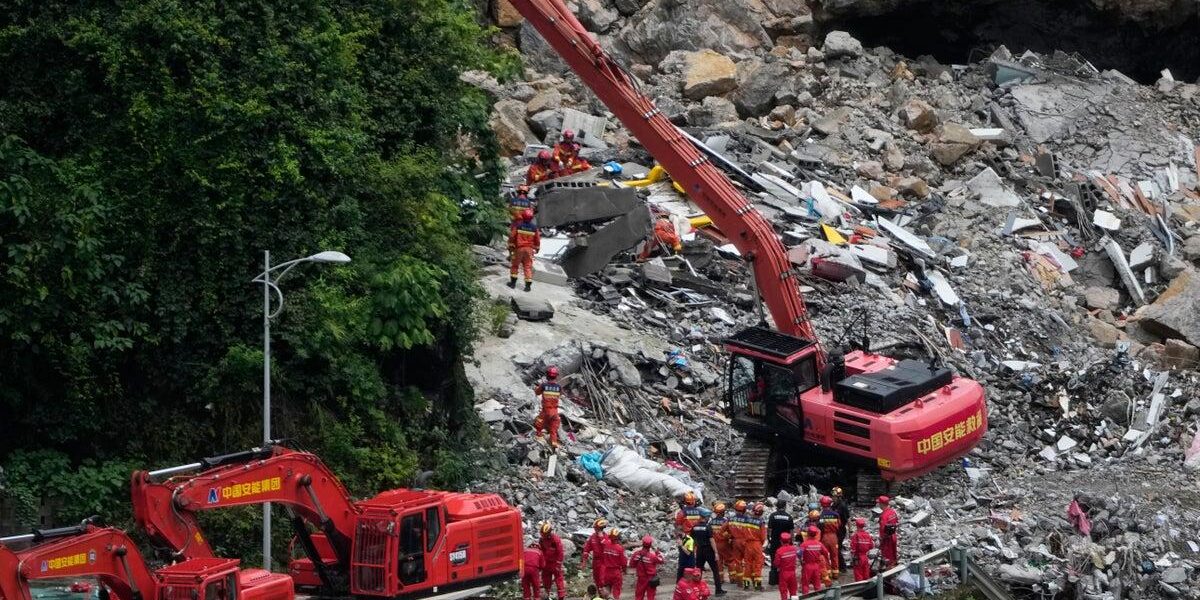 Race Against Time: Rescuers Search for Survivors After China Landslide Kills 8