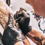 Tech Founder Faces Backlash for Tattooing Company Logo on Potential Employees