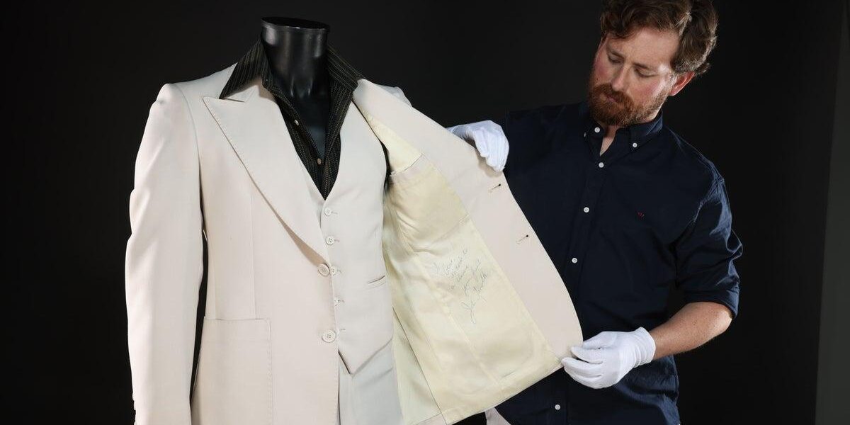 John Travolta’s Iconic ‘Saturday Night Fever’ Suit Among Movie Props Auctioned