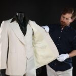 John Travolta’s Iconic ‘Saturday Night Fever’ Suit Among Movie Props Auctioned