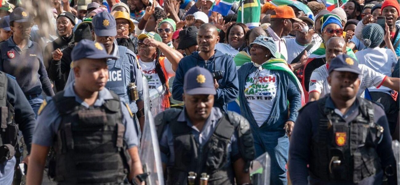 Shadow of a Bullet: South Africa’s Anti-Migrant Fury Explodes Into Murder Investigation