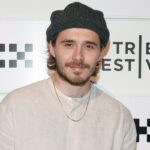 Brooklyn Beckham Opts for Sofa Over VIP Box at World Cup Final Brooklyn Beckham Opts for Sofa Over VIP Box at World Cup Final
