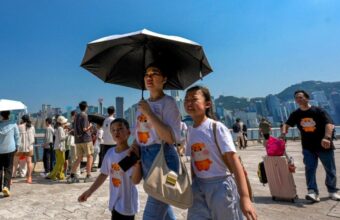 Hong Kong Sets New Record for Hottest Day Amid Typhoon Dolphin Hong Kong Sets New Record for Hottest Day Amid Typhoon Dolphin