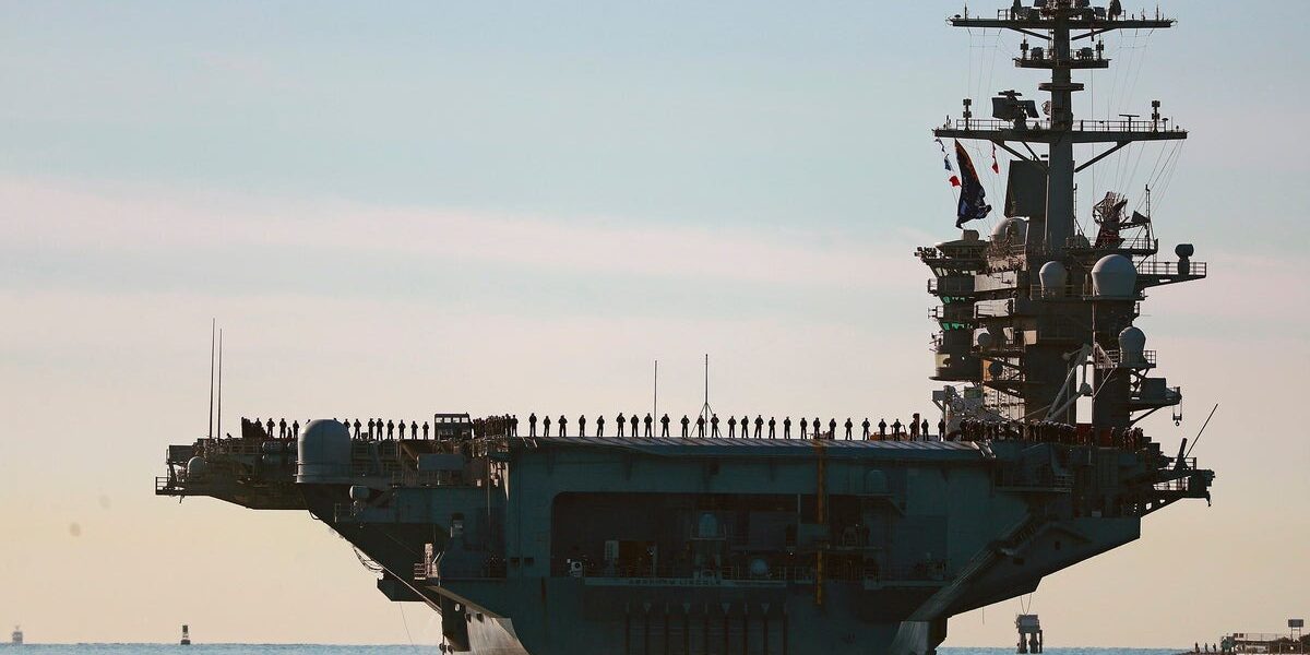 Adm. Brad Cooper Visits USS Lincoln in Arabian Sea Amid Middle East Tensions