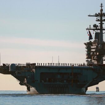 Adm. Brad Cooper Visits USS Lincoln in Arabian Sea Amid Middle East Tensions