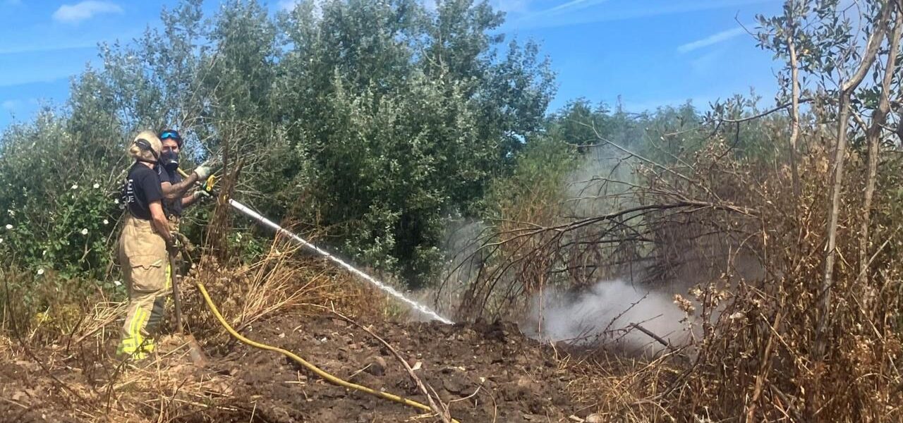 Firefighters Battle Blaze at Suspected Illegal Waste Dump in Trafford Firefighters Battle Blaze at Suspected Illegal Waste Dump in Trafford