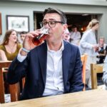 Prime Minister Andy Burnham Visits Pub Amid ‘Vertical Drinking’ Controversy