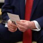 Trump Uses Cheat Card at White House Event, Drawing Comparisons to Biden Criticism