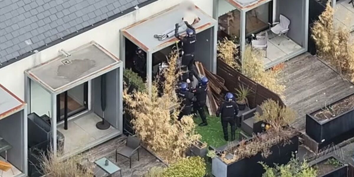 Police Dramatically Arrest Sleeping Man on Salford Roof Police Dramatically Arrest Sleeping Man on Salford Roof