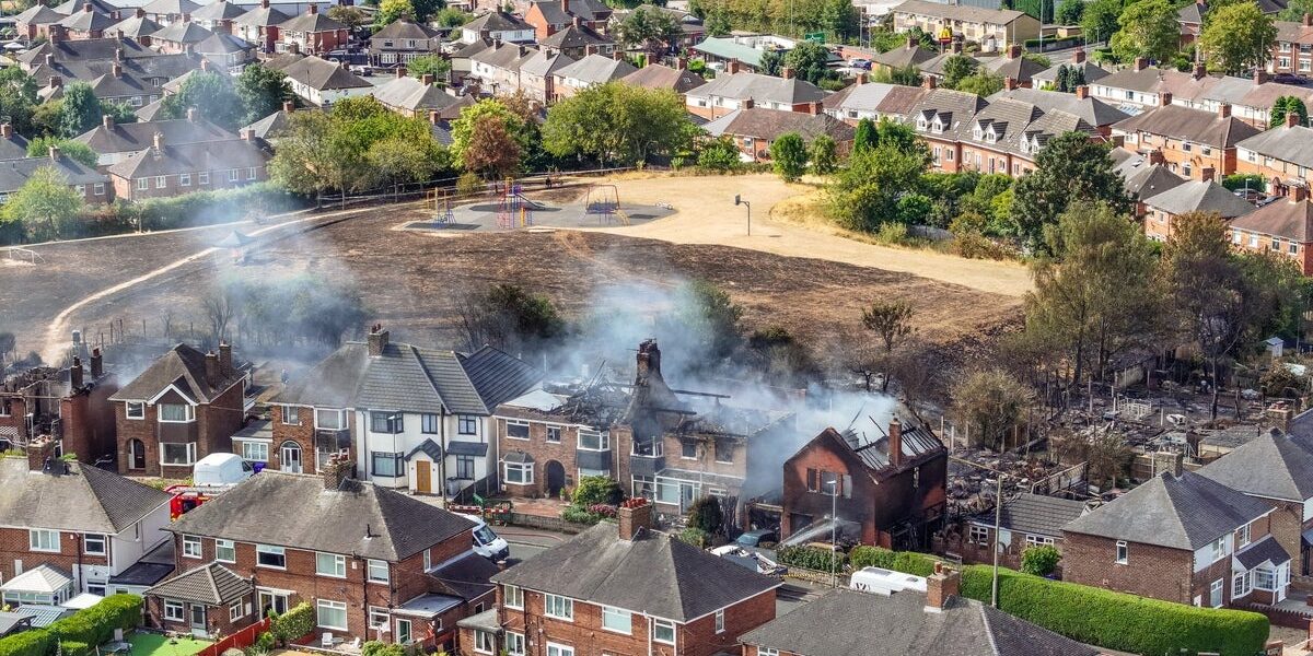 Couple Arrested Following Stoke-on-Trent Grass Fire: Four Houses Damaged Couple Arrested Following Stoke-on-Trent Grass Fire: Four Houses Damaged