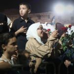 Syrian Army Helicopters Drop Roses on Damascus Festival Crowds
