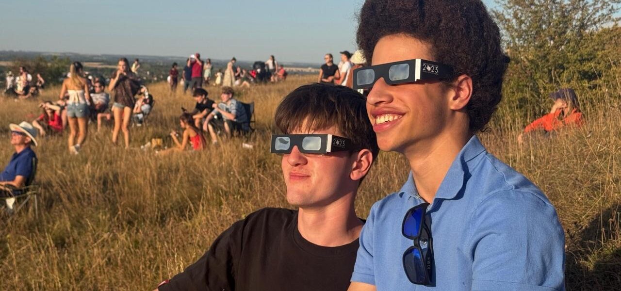 Hundreds Gather Safely on Hillside to Witness Rare Solar Eclipse Hundreds Gather Safely on Hillside to Witness Rare Solar Eclipse
