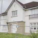 Police Investigate Car Crash into House in Glasgow Suburb