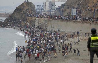 EU Unity Tested: Migrant Crisis Signals Challenges Ahead in China Trade Battle