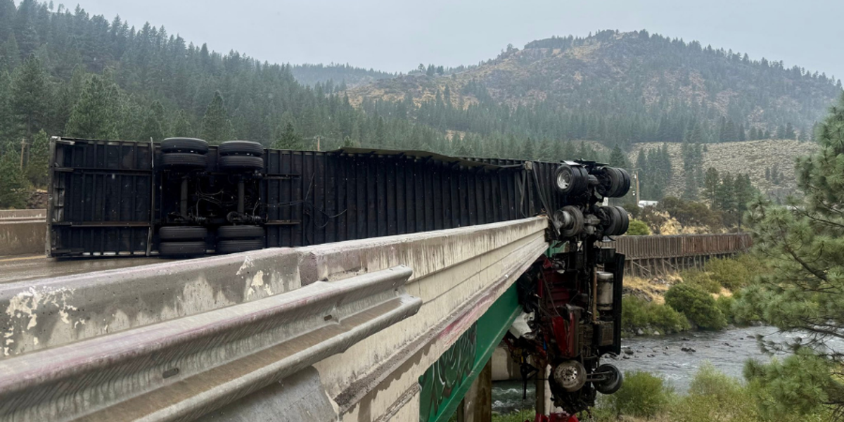 Dramatic Truck Crash Leaves Cab Dangling Over California Bridge, Driver Injured Dramatic Truck Crash Leaves Cab Dangling Over California Bridge, Driver Injured