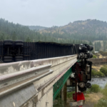 Dramatic Truck Crash Leaves Cab Dangling Over California Bridge, Driver Injured Dramatic Truck Crash Leaves Cab Dangling Over California Bridge, Driver Injured