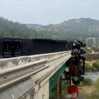 Dramatic Truck Crash Leaves Cab Dangling Over California Bridge, Driver Injured Dramatic Truck Crash Leaves Cab Dangling Over California Bridge, Driver Injured