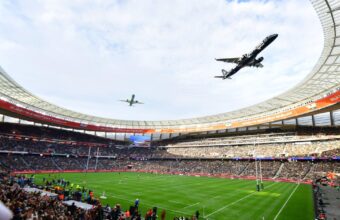 Spectator Awestruck by Daring Low Flyover at Cape Town Rugby Stadium