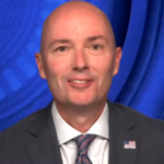 Utah Gov. Cox Calls for Federal Action on AI and Political Unity Amid Midterm Tensions