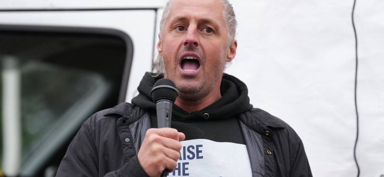 Activist Leader Faces Multiple Charges for Flag Campaign