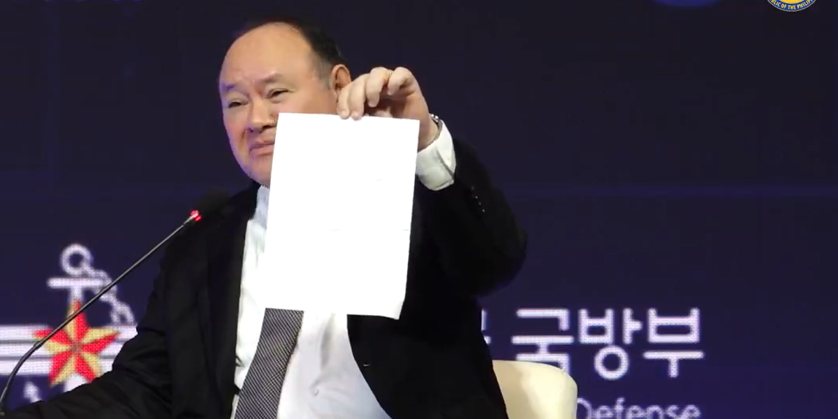 Philippine Official Confronts China After Note Slipped During Speech Philippine Official Confronts China After Note Slipped During Speech