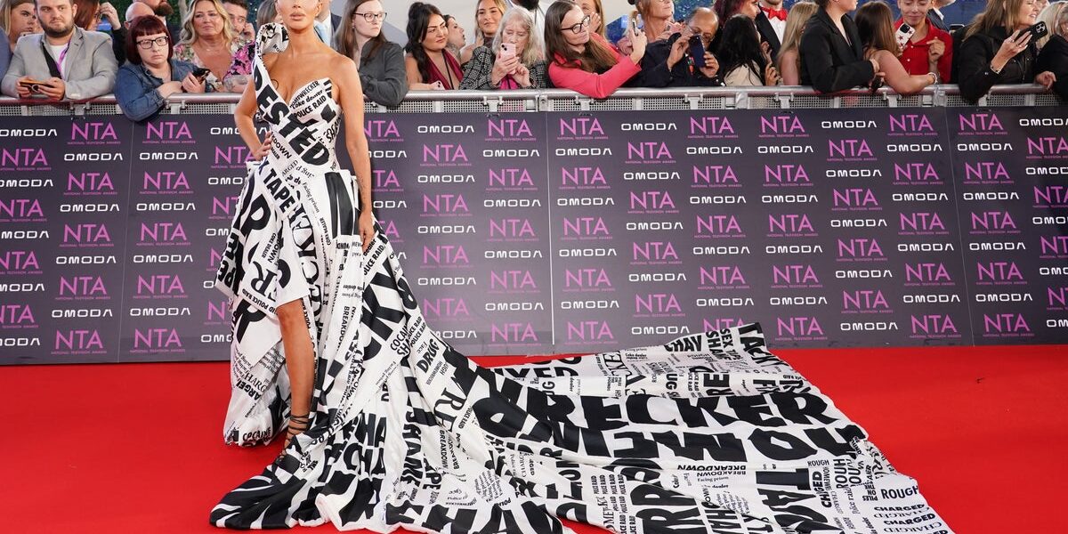 Tulisa Makes Bold Statement at NTA Red Carpet with Gown Featuring Drug Sting Headlines Tulisa Makes Bold Statement at NTA Red Carpet with Gown Featuring Drug Sting Headlines