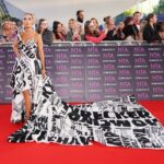 Tulisa Makes Bold Statement at NTA Red Carpet with Gown Featuring Drug Sting Headlines