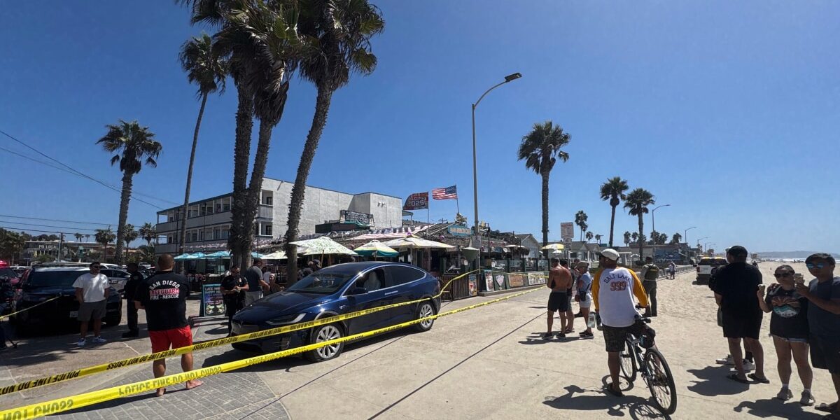 Man Fleeing Stolen Tesla Hits Woman on San Diego Boardwalk, Chased by Bystanders Man Fleeing Stolen Tesla Hits Woman on San Diego Boardwalk, Chased by Bystanders
